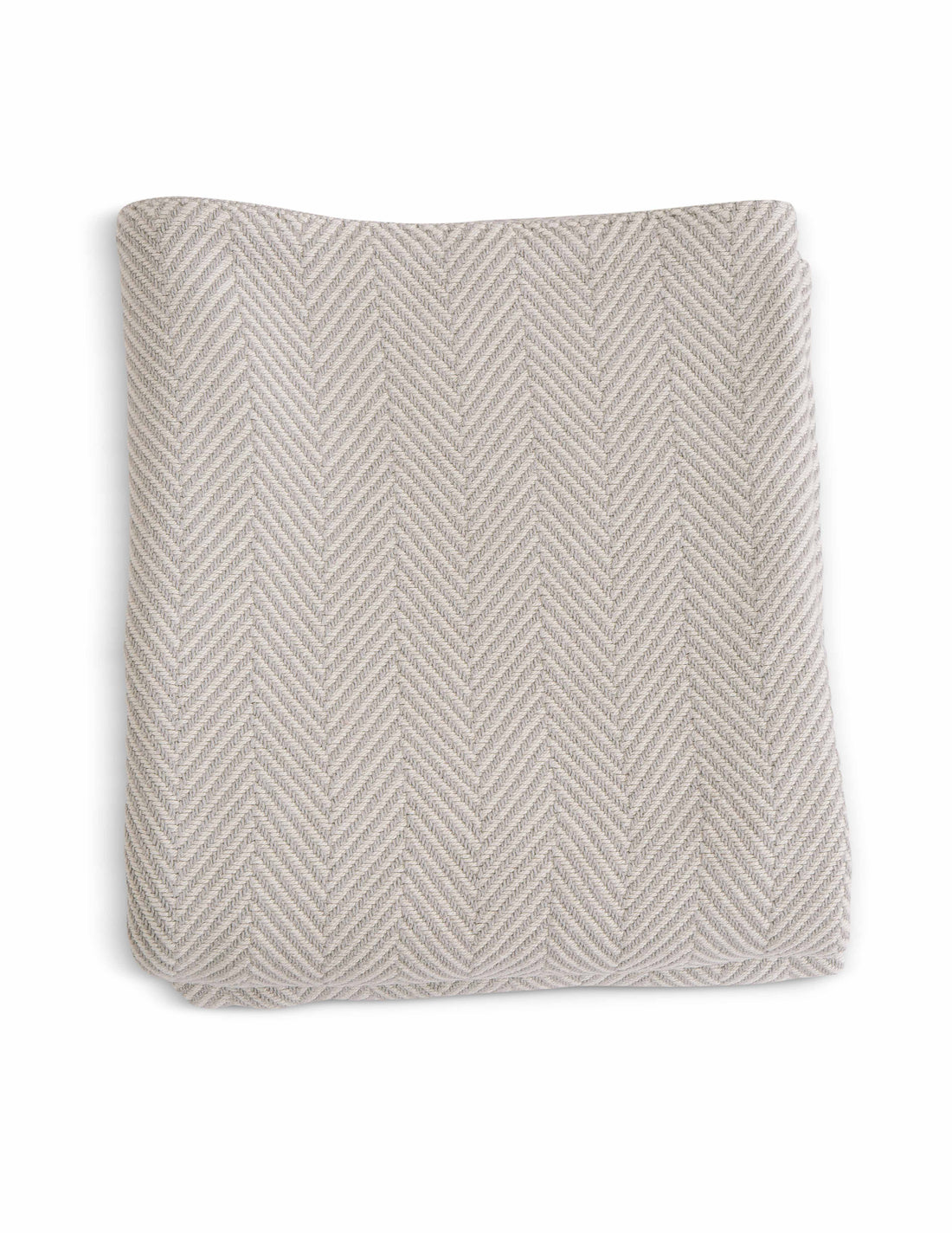 Evangeline's Natural/grey colored 100% cotton herringbone woven blanket, folded. Sizes twin, full/queen, and king. The breathable quality of cotton with the weight and warmth of a wool blanket.