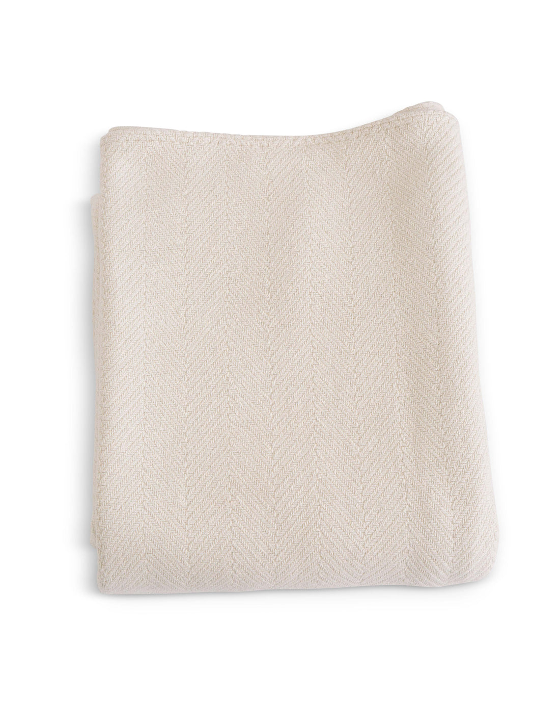 Evangeline's Natural colored 100% cotton herringbone woven blanket, folded. Sizes twin, full/queen, and king. The breathable quality of cotton with the weight and warmth of a wool blanket. 