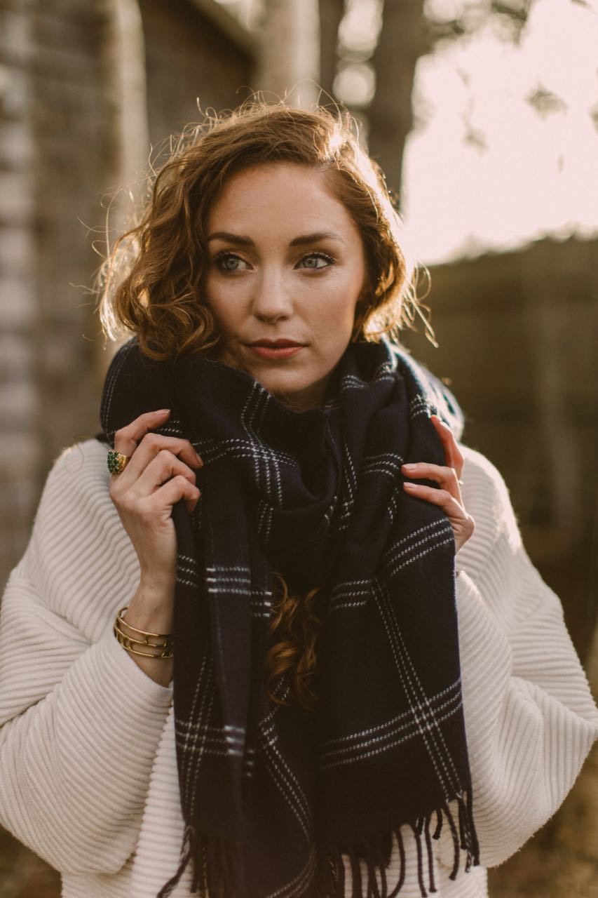 Woman with merino lambswool wearable wrap around her neck